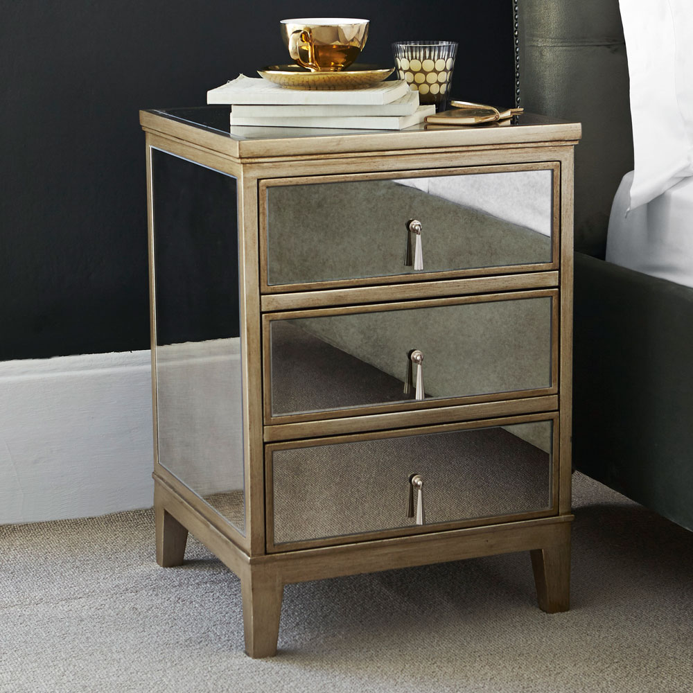 gold and mirrored bedside table